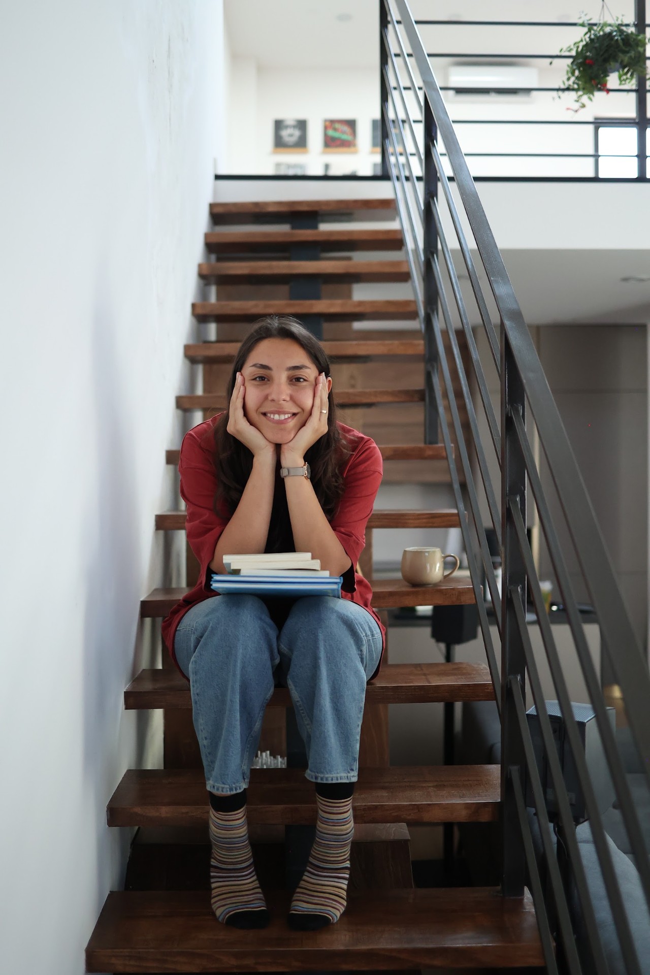 Gayane Aghabalyan holding books